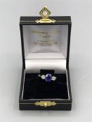 A sapphire and diamond ring