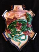 A Ceramic plaque with Dragon theme