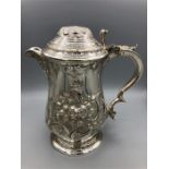 A silver plated tankard