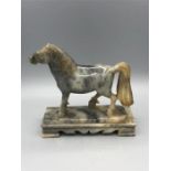 A marble horse statue