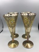 Four hand painted wine glasses