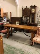 A large console table with scrolled iron detail, 2m long and 50cm wide