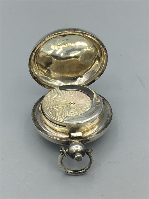 A plain silver sovereign case, hallmarked Birmingham 1883/4 - Image 2 of 2