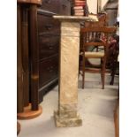 A marble effect, wooden plinth,