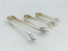 Three silver sugar tongs in graduated sizes, with claw grabs. S.L Birmingham. EV Sheffield 1938, P.