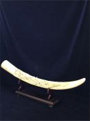 A faux ivory tusk