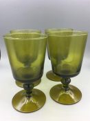 A set of four Mid Century water glasses in green
