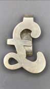 A silver pound sign hallmarked money clip