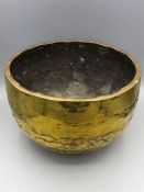 A Chinese brass bowl