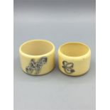 Two antique ivory and silver napkin rings (Pre 1947)