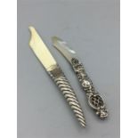 Two silver handled letter openers, one ivory, hallmarked 1846/7 and another mother of pearl maker C&