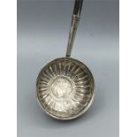 A White metal ladle