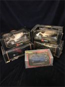 Five Burago die cast model cars