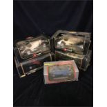 Five Burago die cast model cars