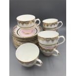 Imperial pale pink and embossed with 22ct gold six tea cups and saucers along with six side plates.