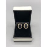 A pair of yellow gold sapphire and diamond cluster clip on earrings 1.6ct's approx