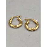 A pair of 9ct gold earrings