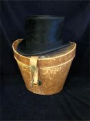 A Top Hat in original leather carry case by Alex Booth of Aberdeen.