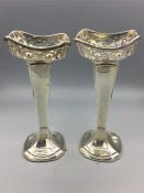 A pair of silver vases with pierced decoration, Birmingham 1914/15