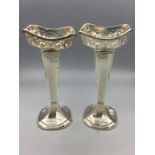 A pair of silver vases with pierced decoration, Birmingham 1914/15