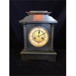 A wooden mantle clock
