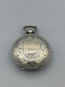 A hallmarked silver sovereign case, engraved decoration all over, hallmarked Birmingham 1909/10