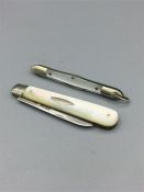 Two mother of pearl handled fruit knives