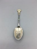 A Winchester jam spoon, hallmarked silver