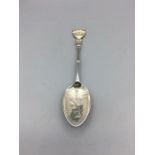 A Winchester jam spoon, hallmarked silver