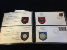 A selection of Papua New Guinea first day covers with proof coins, some silver