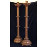 A Pair of ecclesiastical candle sticks