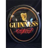 A large illuminated Guinness pub sign with swing bracket, taken out of box for photo.