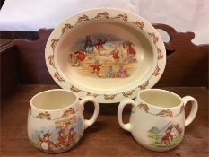 Bunnykins 'To the Camp' mugs, one signed Barbara Vernon and a Seaside bowl