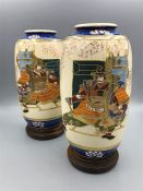 A Pair of Japanese vases on stands