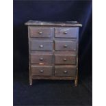 An apprentice piece, eight drawer chest of drawers
