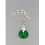 A silver jade and pendant necklace