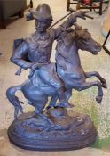 A spelter statue of an Army Officer.