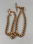 A 9ct rose gold Albert chain (49.7g)