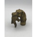 Bronze top for a walking stick in the shape of a dog retrieving