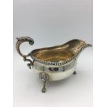 A Goldmisths & Co silver sauce boat, hallmarked London 1916-17, (431g)