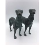 A pair of hunting dogs in spelter, probably Borzoi.