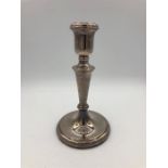 A Hallmarked silver candlestick