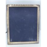 A Hallmarked silver picture frame 29cm x 24cm