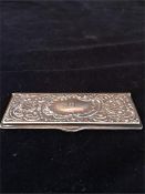 A Sterling Silver cuttings collector with ornate decoration