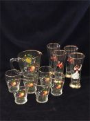 A set of fruit glasses and jug