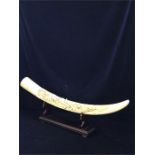 A faux ivory tusk