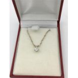 An 18ct white gold diamond single stone pendant necklace of 20 points approx