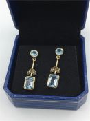 A pair of yellow gold Aquamarine drop earrings