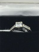 A 9ct white gold and CZ stone ring