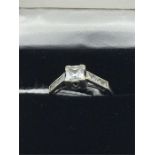 A 9ct white gold and CZ stone ring